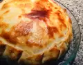 Tarta casera de crema y verdeo, dorada y cremosa, perfecta para compartir.