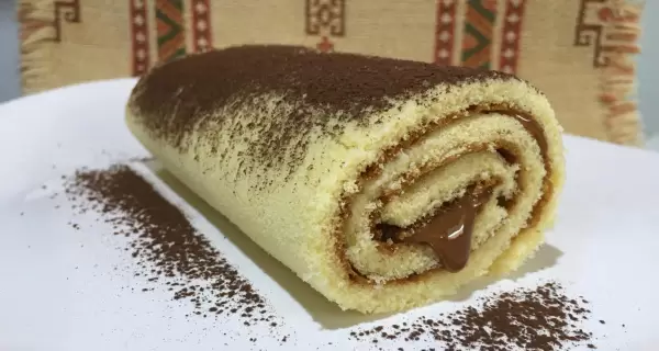 Arrollado de dulce de leche, suave y delicioso.