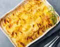 Papas gratinadas con crema y queso
