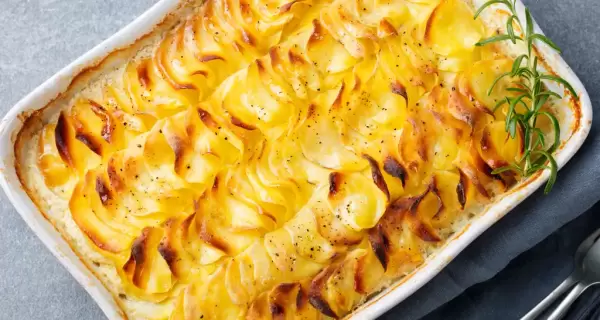 Papas gratinadas con crema y queso