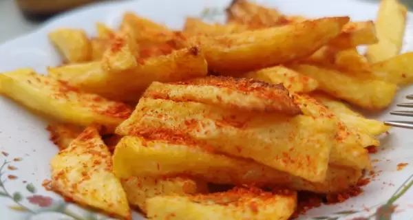 Papas especiadas al horno con sabor distinto y textura crocante por fuera.